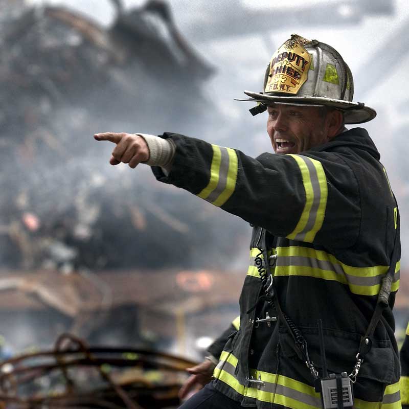 A fire fighter shouting commands.
